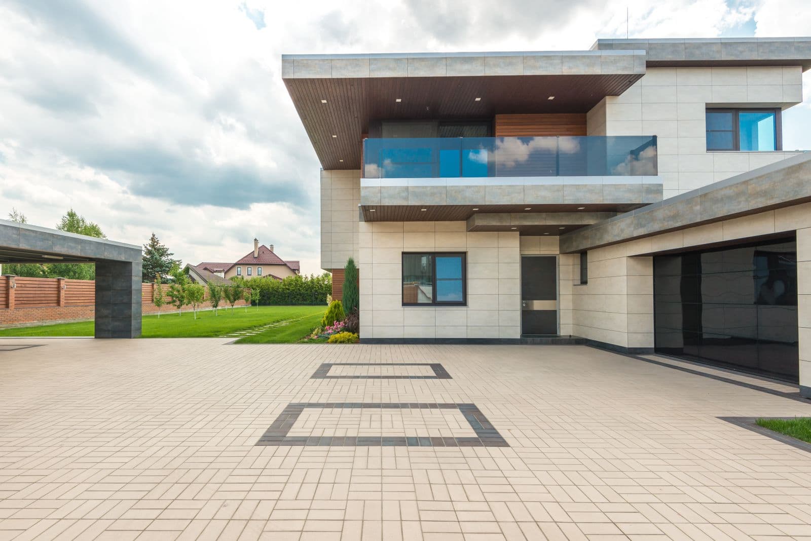 Modern house exterior with a clean paved driveway